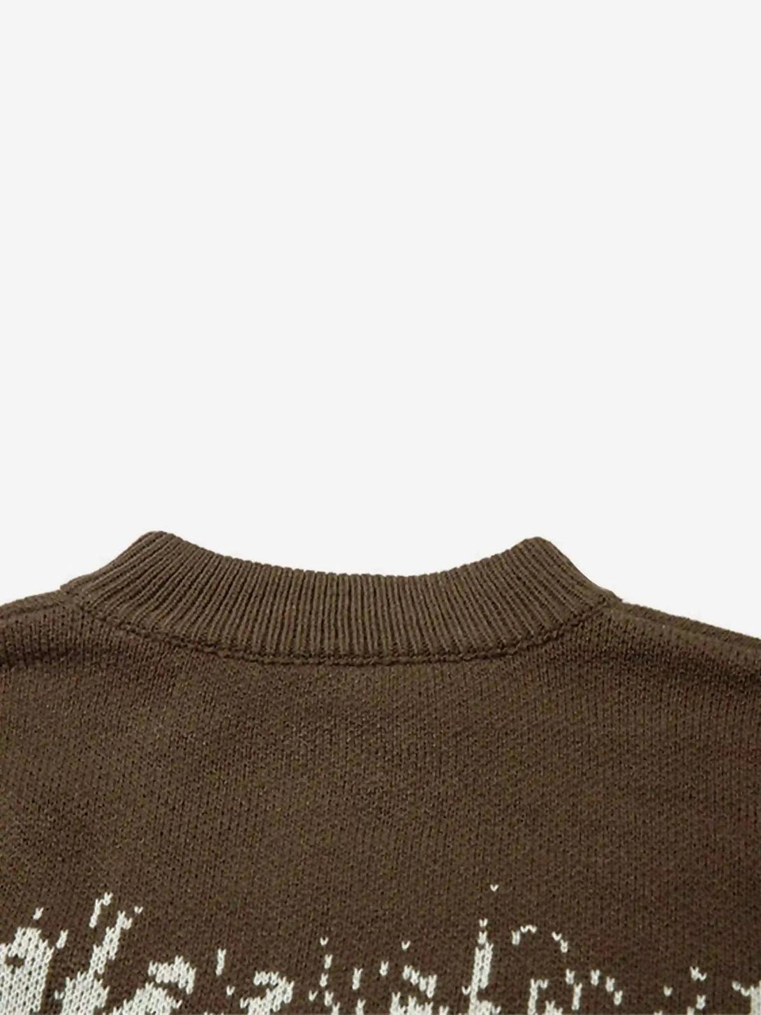 Detailed fabric and stitching on the back of a brown TALISHKO sweater with jacquard design.