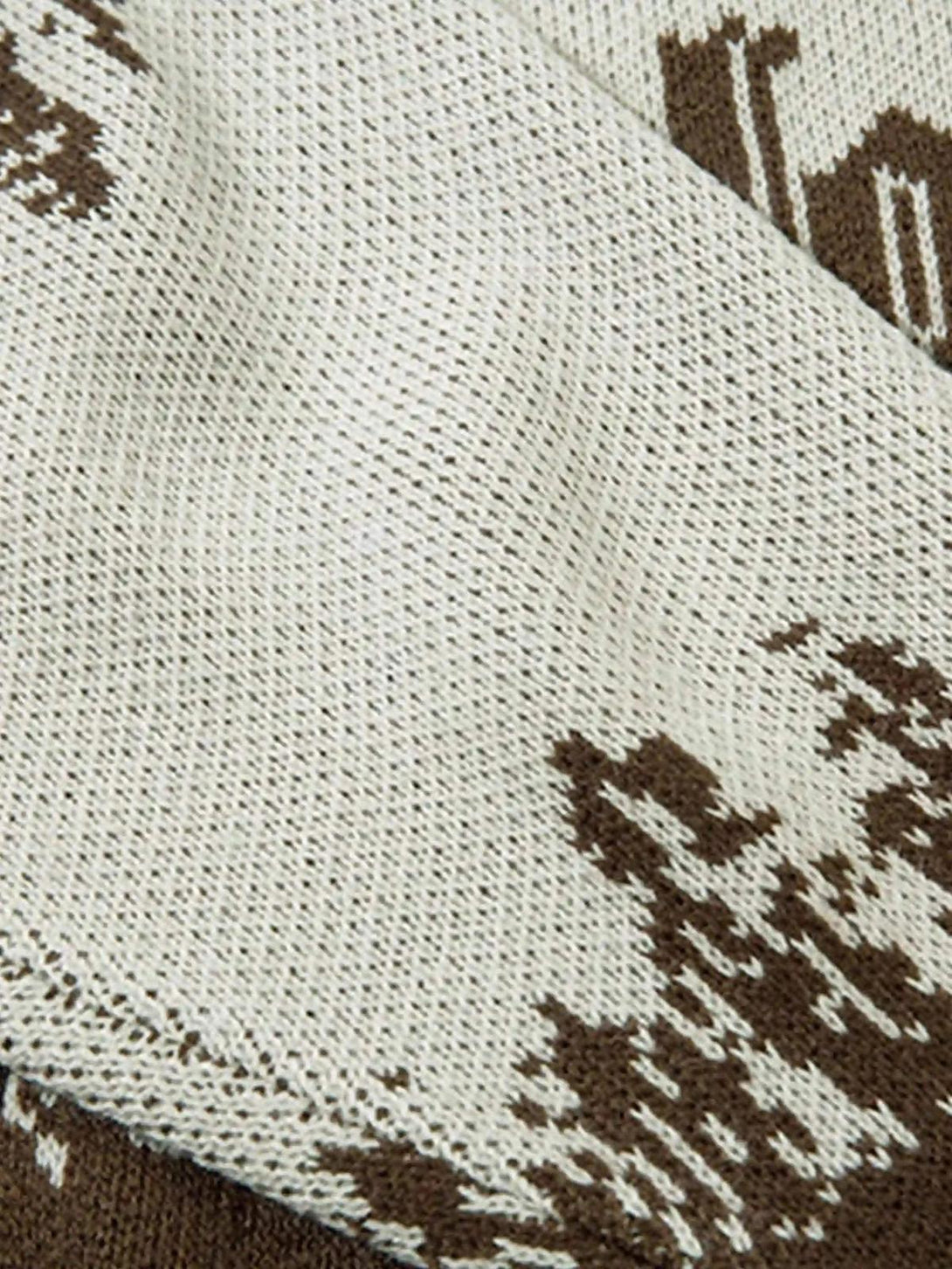 Intricate look at the jacquard pattern and texture on a TALISHKO sweater.