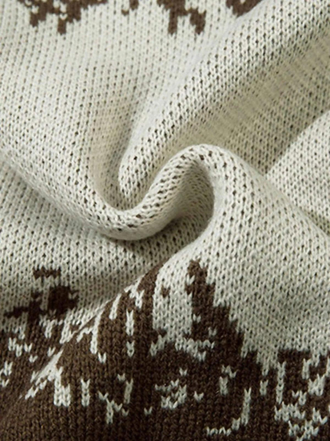 Texture and pattern showcased on a TALISHKO sweater with intricate jacquard stitching.