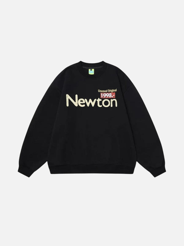 Black crew sweatshirt with "Newton" text, designed by TALISHKO, showcasing front detail.