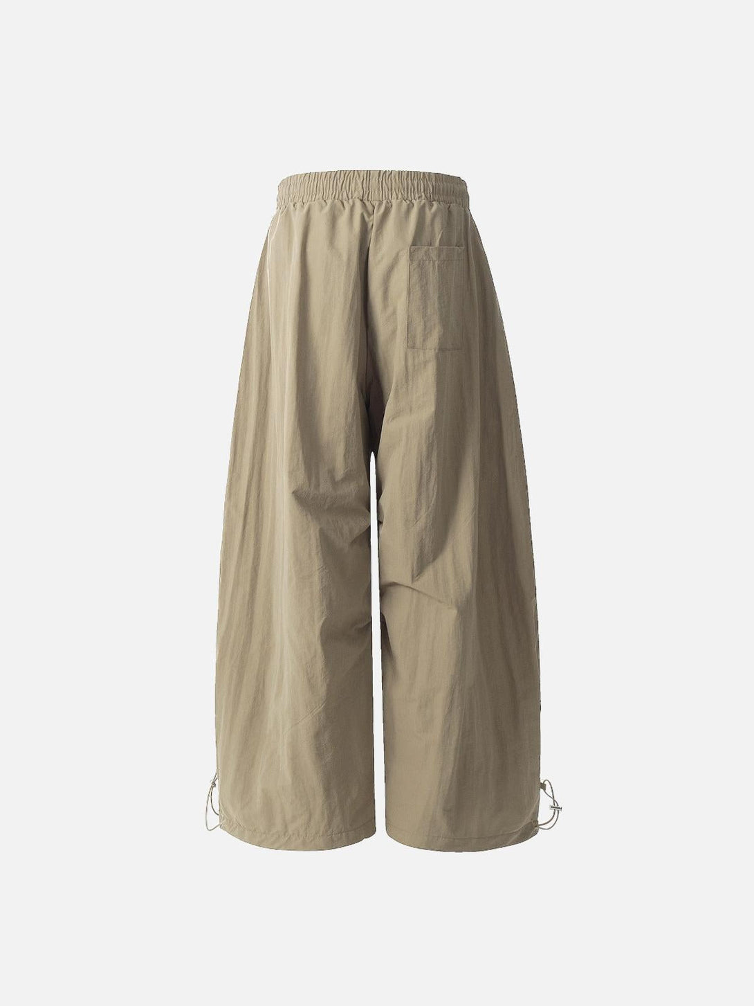 Back view of khaki baggy pleated cargo pants by TALISHKO, showcasing relaxed fit and pocket detail.