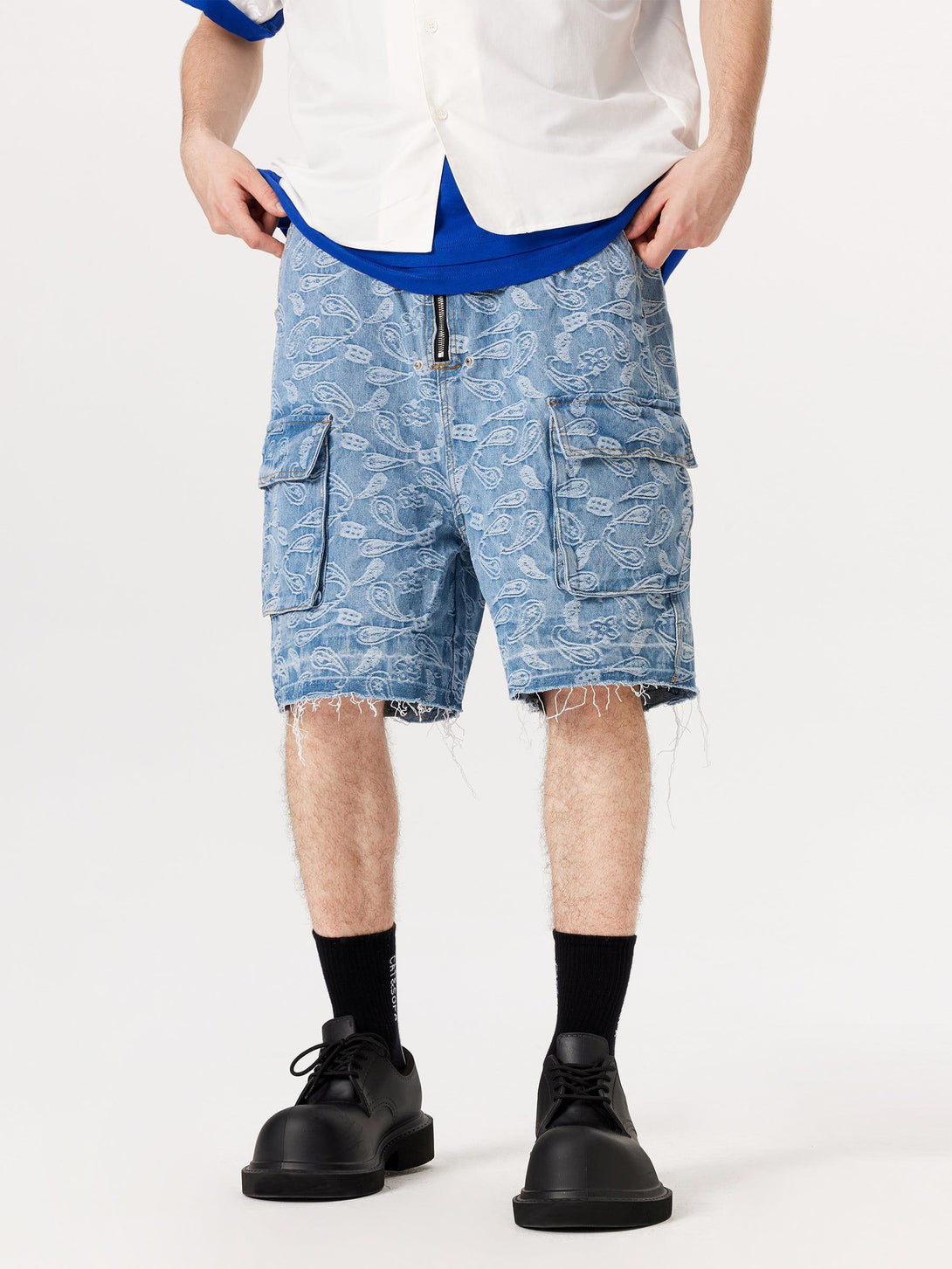 Model styled in bandana jacquard washed jorts by TALISHKO, capturing a laid-back summer vibe.