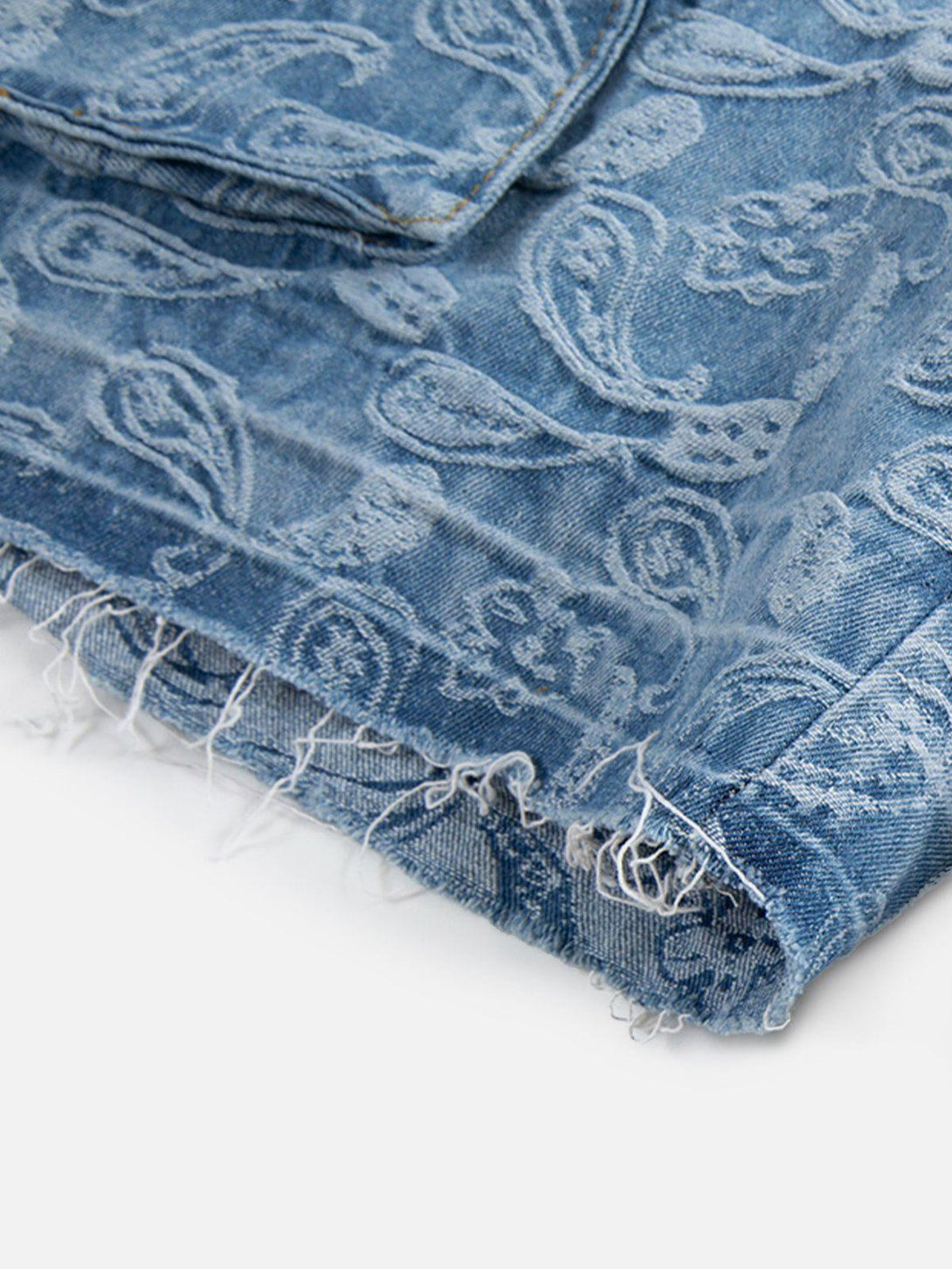Texture and pattern showcased in TALISHKO's bandana jacquard washed jorts, highlighting casual detail.