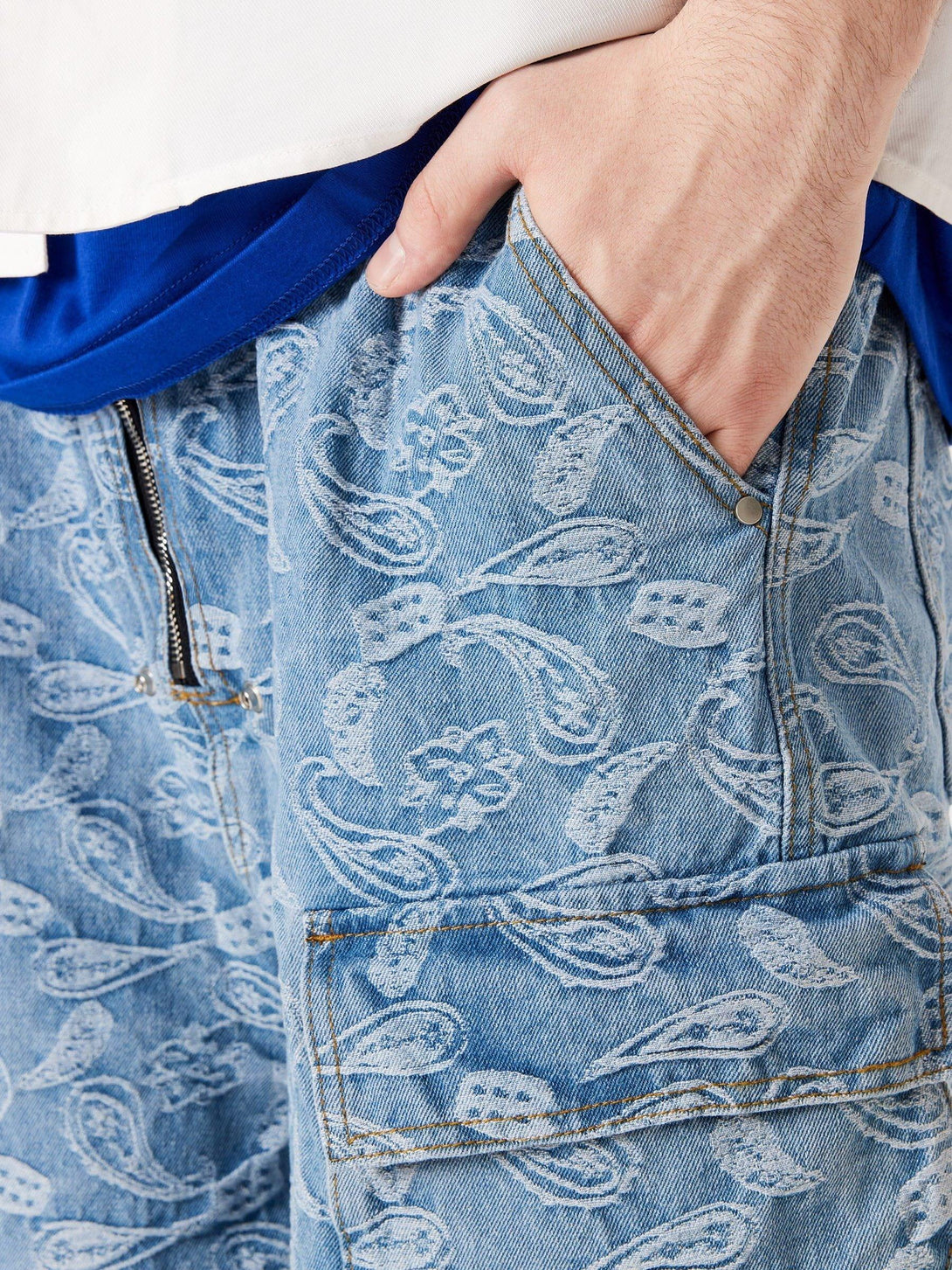 Detailed fabric and stitching of TALISHKO's bandana jacquard washed jorts with a casual vibe.