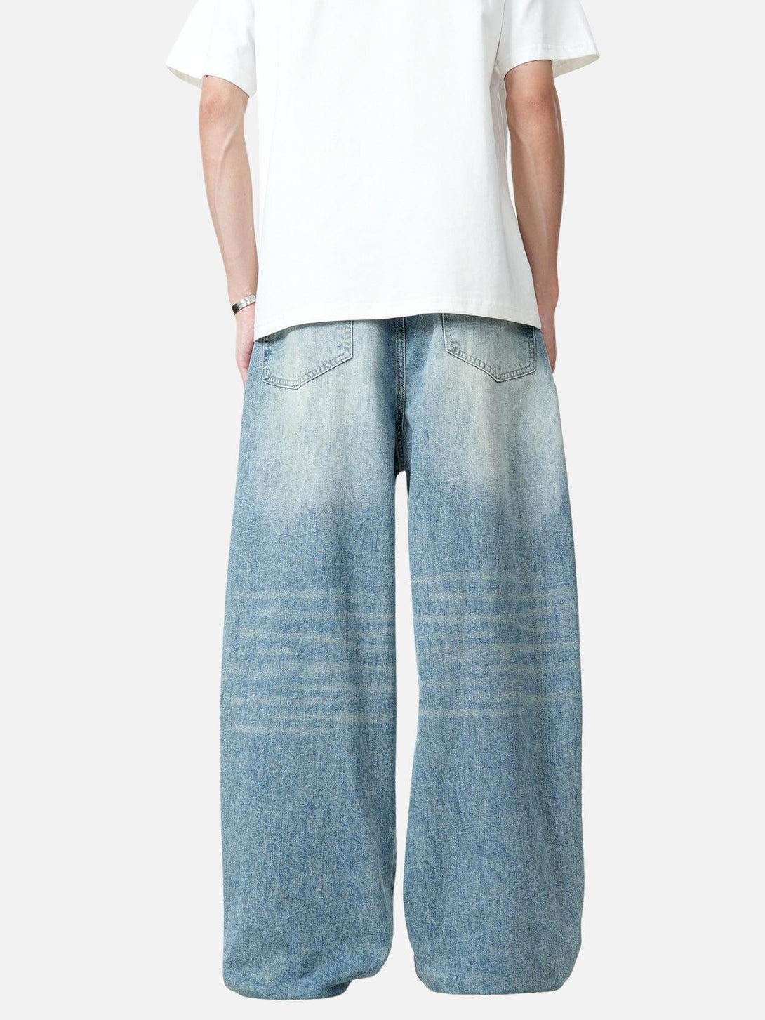 TALISHKO baggy jeans from the back, highlighting their relaxed fit and casual style.