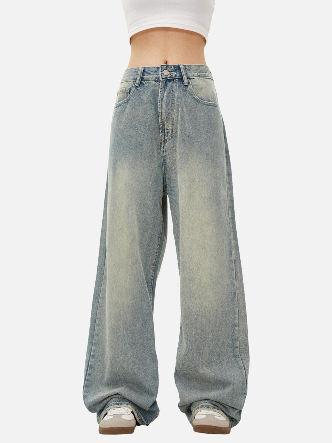 Model wearing TALISHKO basic loose jeans, highlighting their relaxed fit and casual vibe.