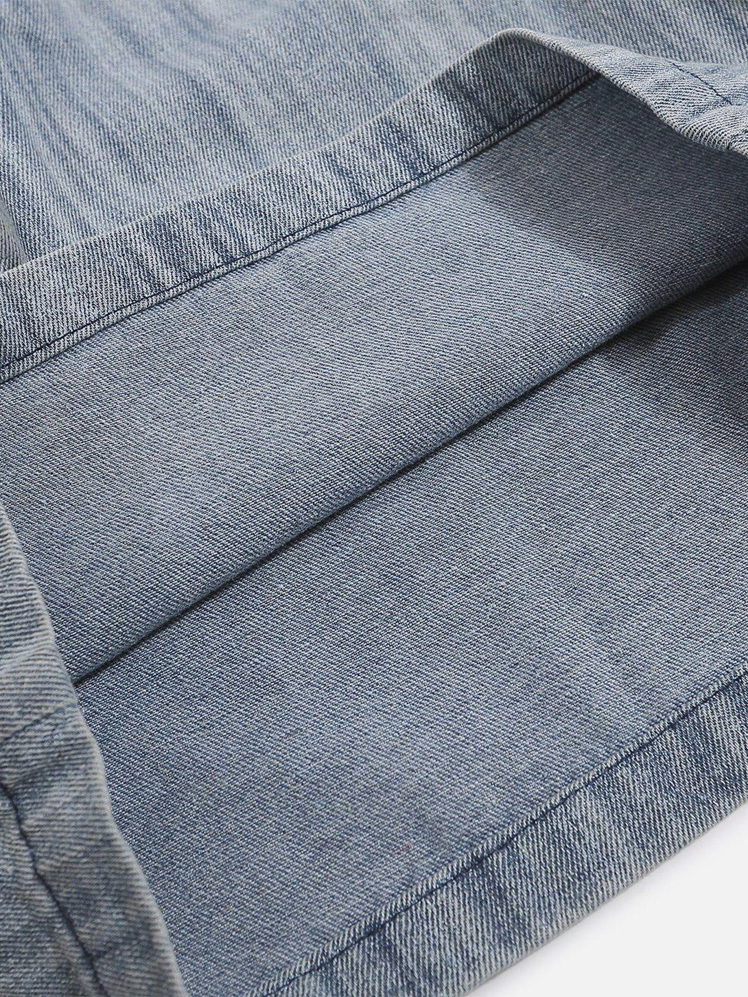 A detailed view of TALISHKO jorts, highlighting the intricate denim weave and craftsmanship.