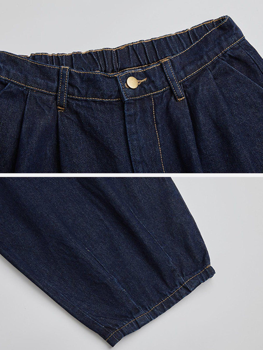 Detailed view of TALISHKO baggy jeans, highlighting the adjustable waistband and tapered leg.
