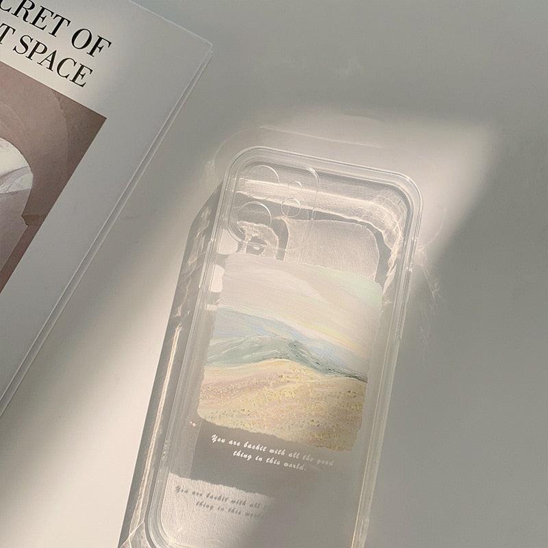 A serene beach painting decorates the TALISHKO iPhone case, capturing a tranquil landscape.
