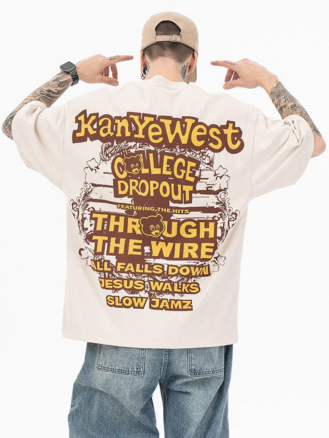 Back view of TALISHKO hip hop T-shirt featuring bold bear and letter print, styled casually.