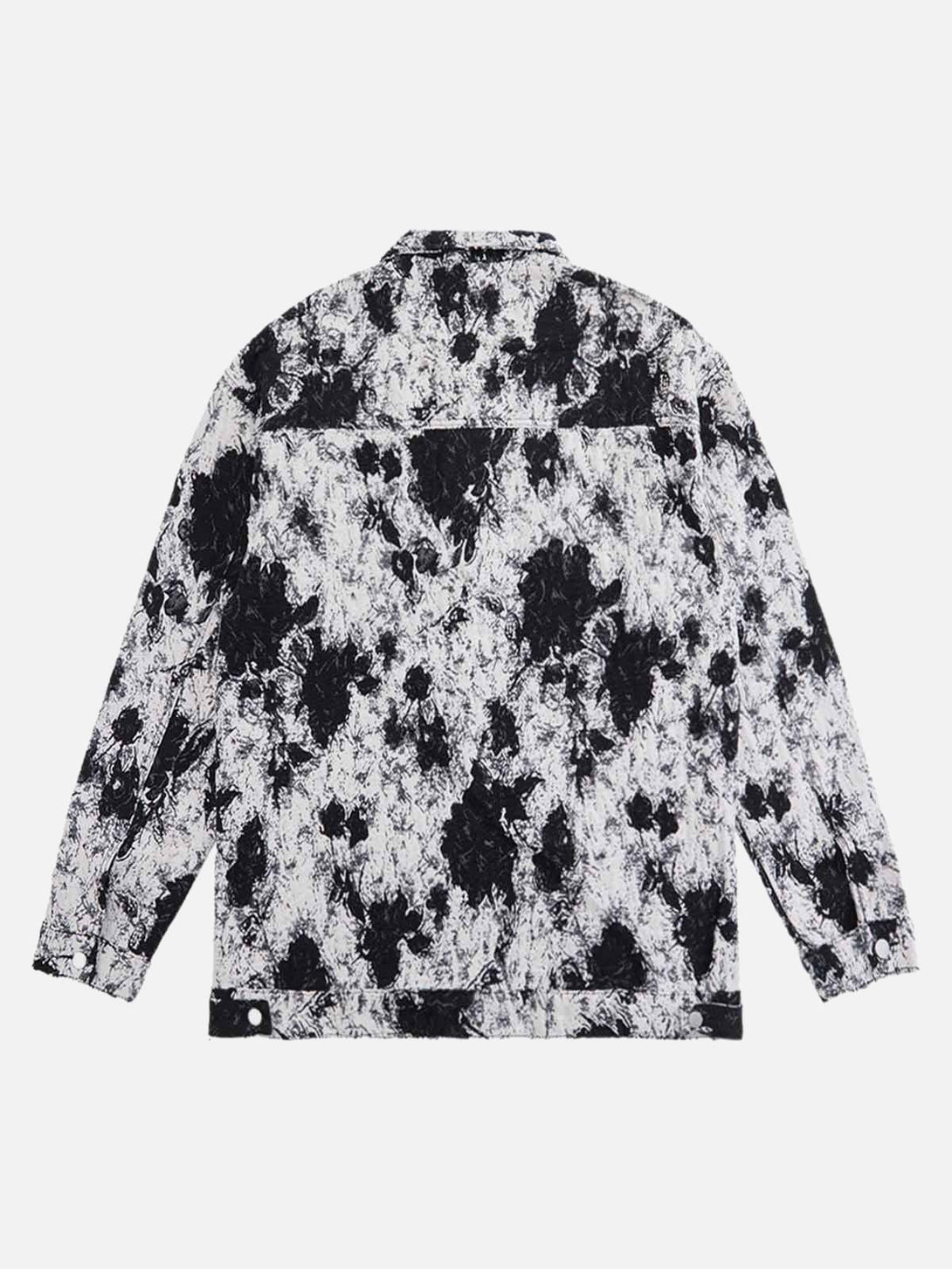Back view of a black and white floral denim jacket by TALISHKO, showcasing bold pattern.
