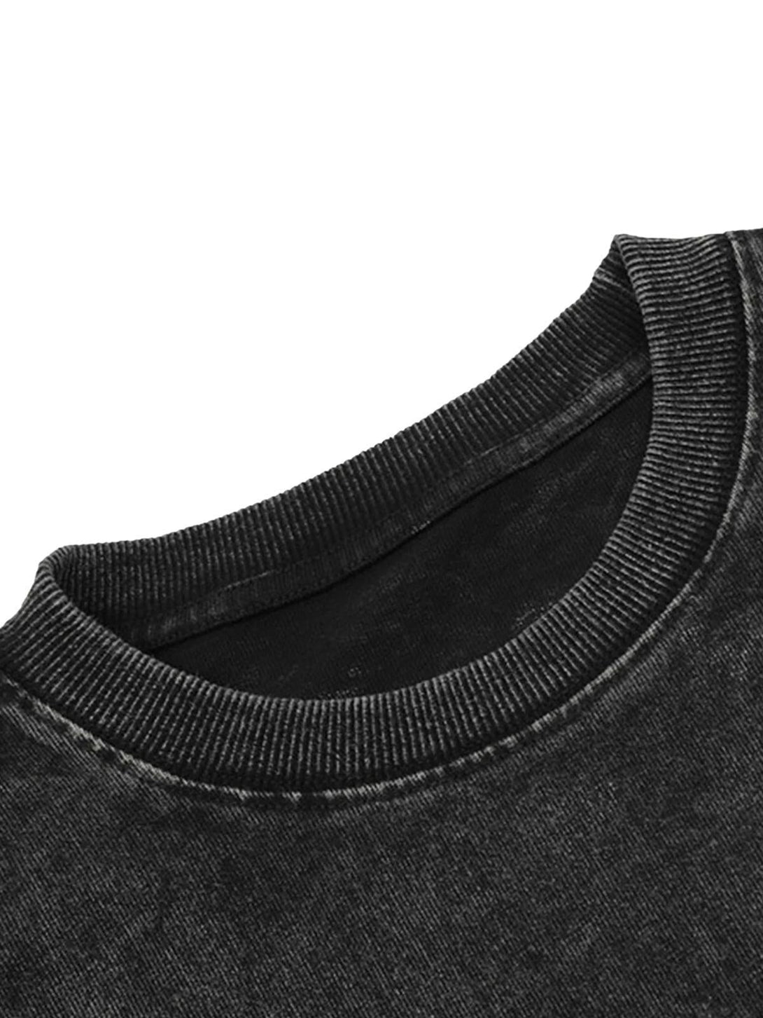 Zoomed-in texture of a black T-shirt collar by TALISHKO, highlighting intricate stitching.