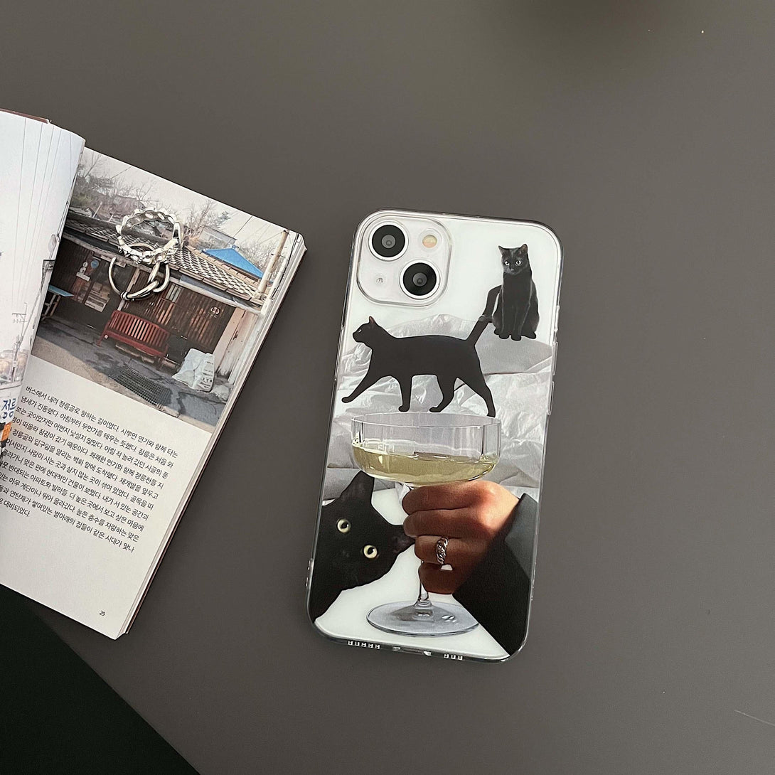 Playful black cat iPhone case by TALISHKO, featuring a unique champagne glass design.