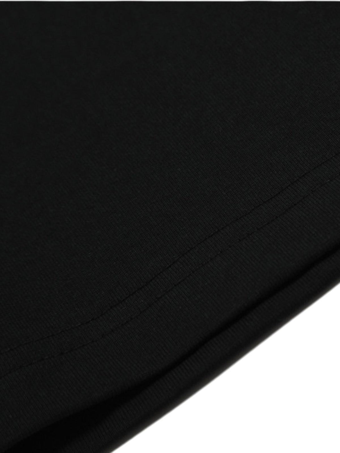 Detailed fabric and stitching of the black crew neck T-shirt by TALISHKO.