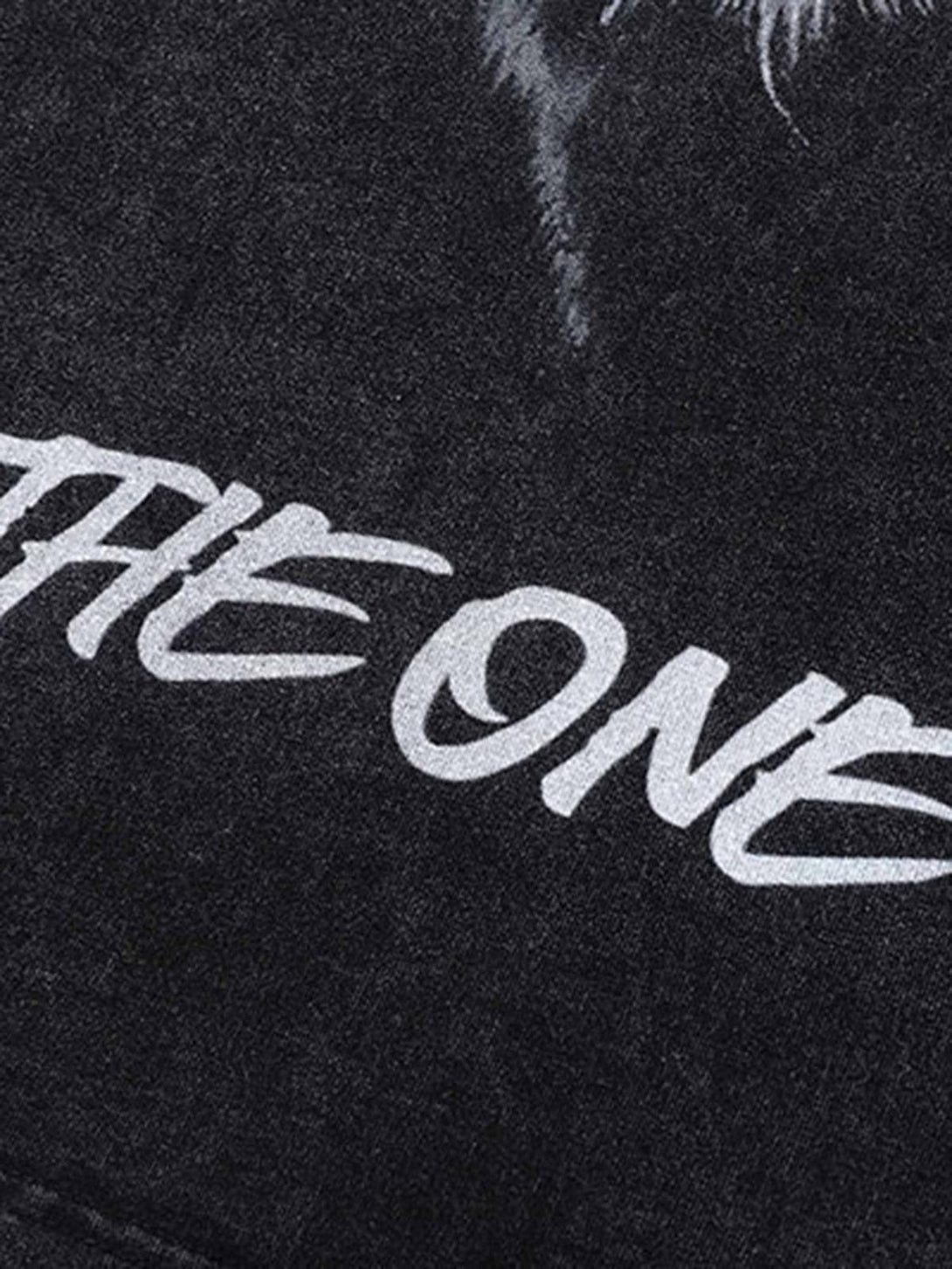 Focusing on the text design of the TALISHKO black T-shirt, highlighting its bold style statement.