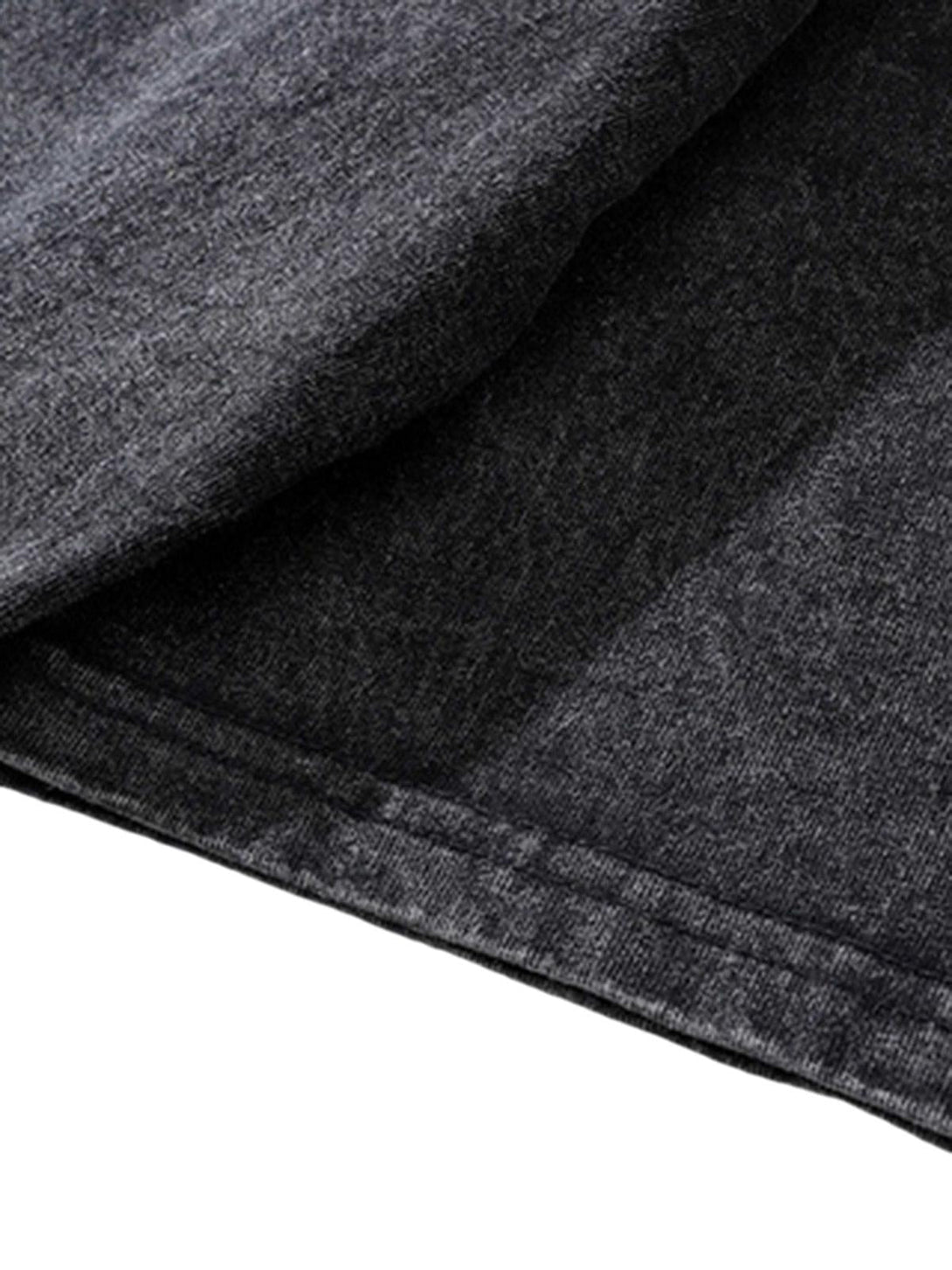 Detailed fabric and stitching of TALISHKO T-shirt, highlighting the soft, textured material.