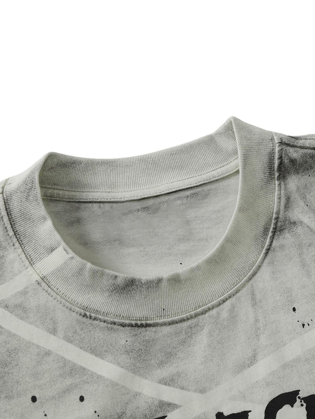 Intricate look at the neckline and pattern of a TALISHKO oversized tie-dye T-shirt in gray.