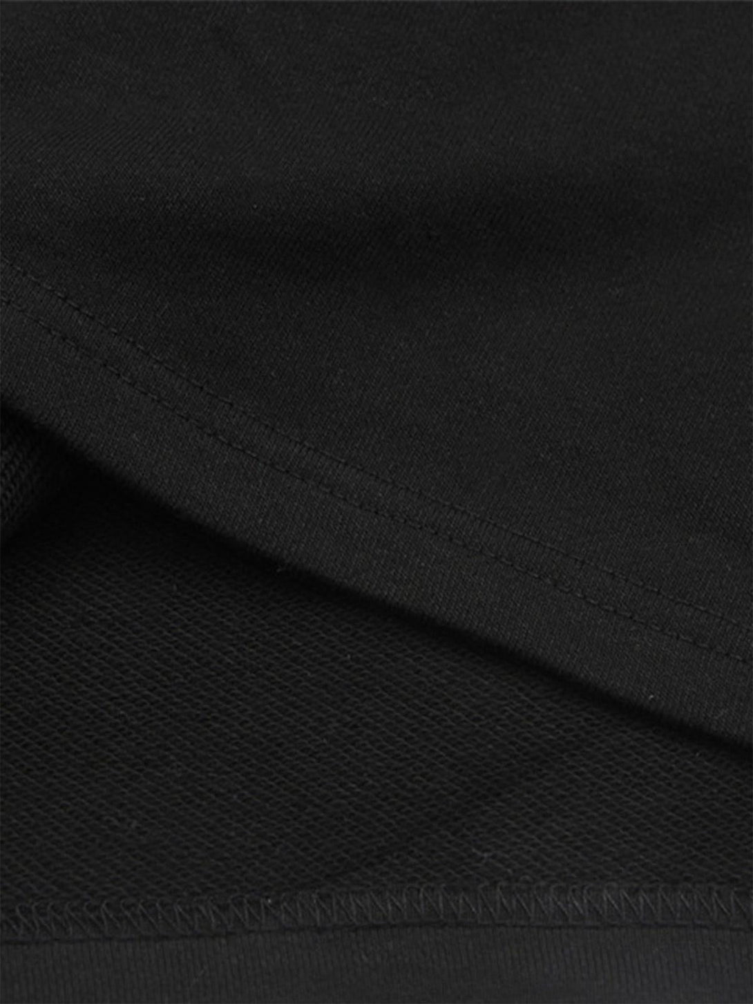 Detailed fabric and stitching of a black long sleeve T-shirt by TALISHKO.