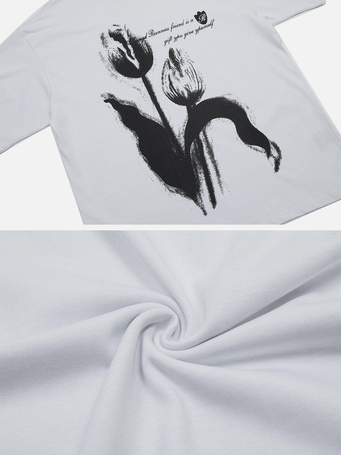 White tee featuring a blurred tulip print and text design by TALISHKO, highlighting artistic detail.