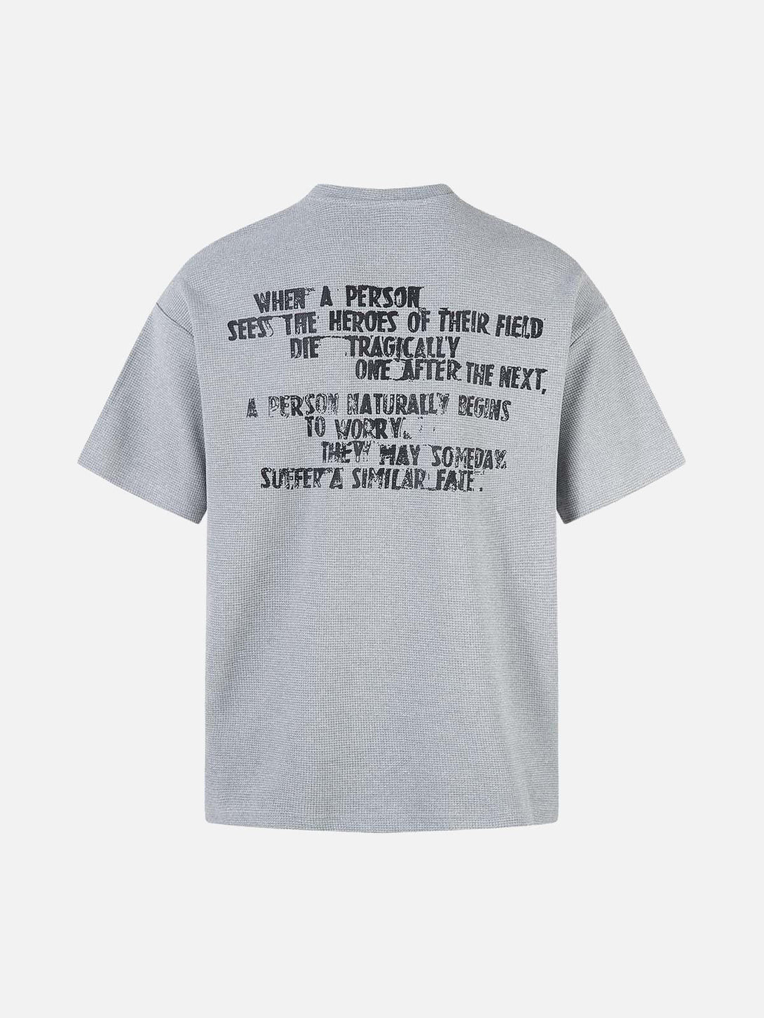 Back view of gray graphic T-shirt by TALISHKO, showcasing bold statement text.