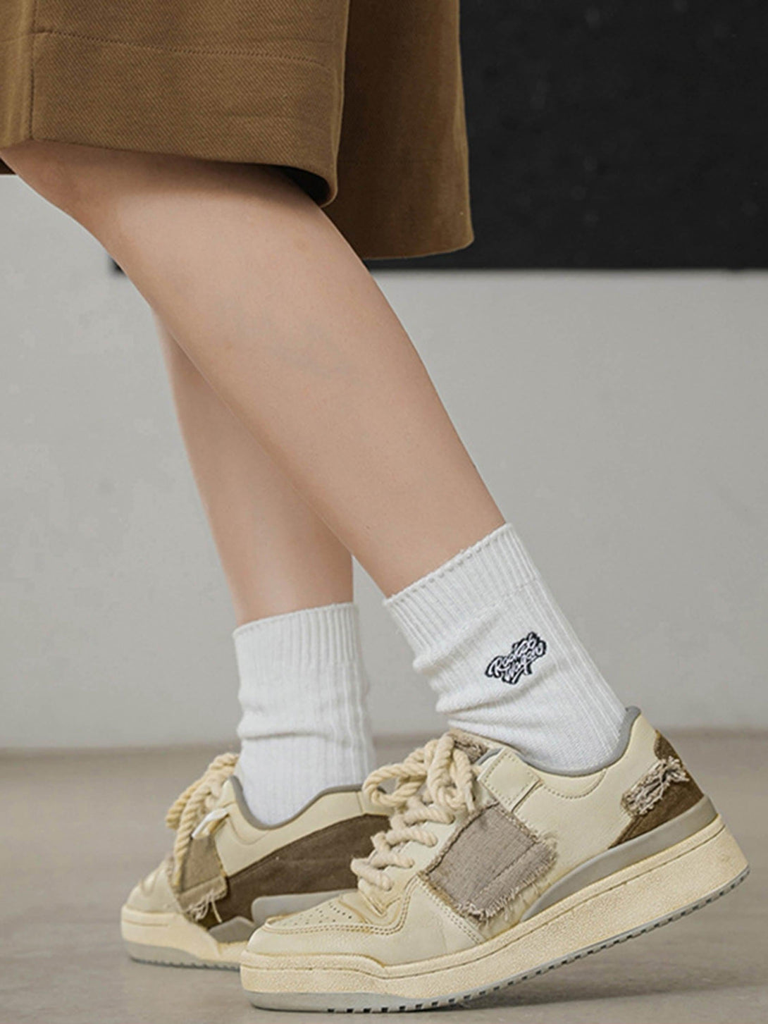 Comfortable casual shoes by TALISHKO, showcasing a stylish design with white socks.