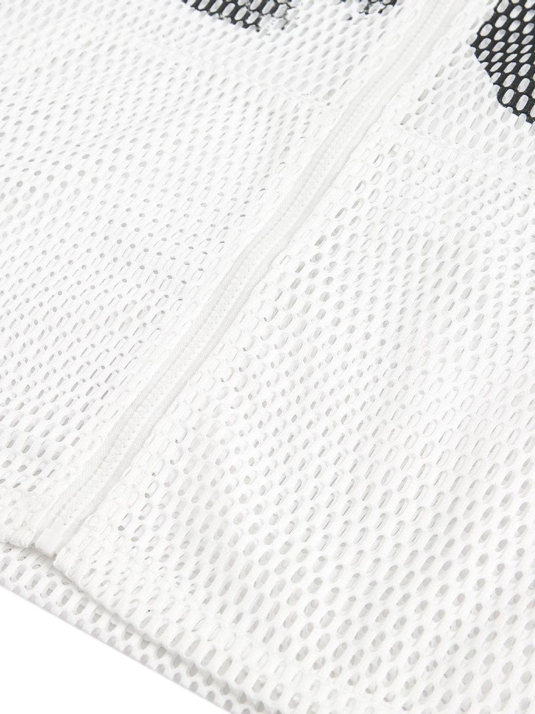 Detailed fabric and stitching of the breathable mesh jersey by TALISHKO.