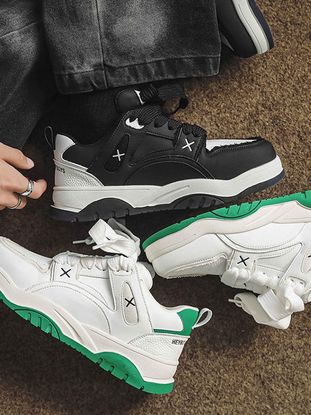 TALISHKO's black and white board shoes and white with green accents, styled with casual denim.