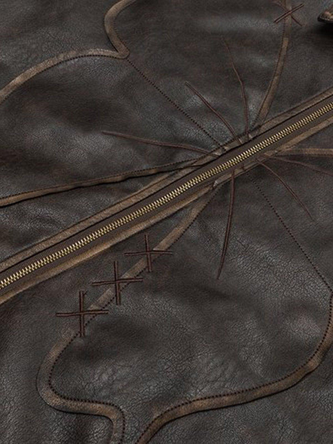 Intricate look at TALISHKO's butterfly faux leather jacket, focusing on unique stitching details.