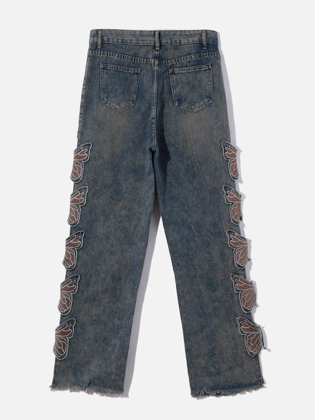 Back view of TALISHKO jeans with butterfly cutouts along the sides, offering a unique, edgy look.