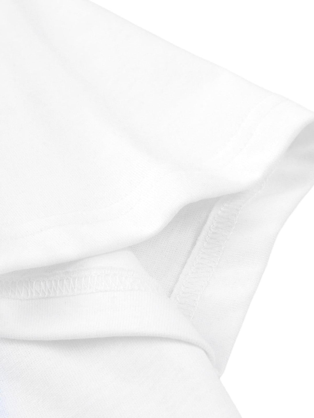 Detailed fabric and stitching on a white TALISHKO T-shirt, showcasing quality craftsmanship.