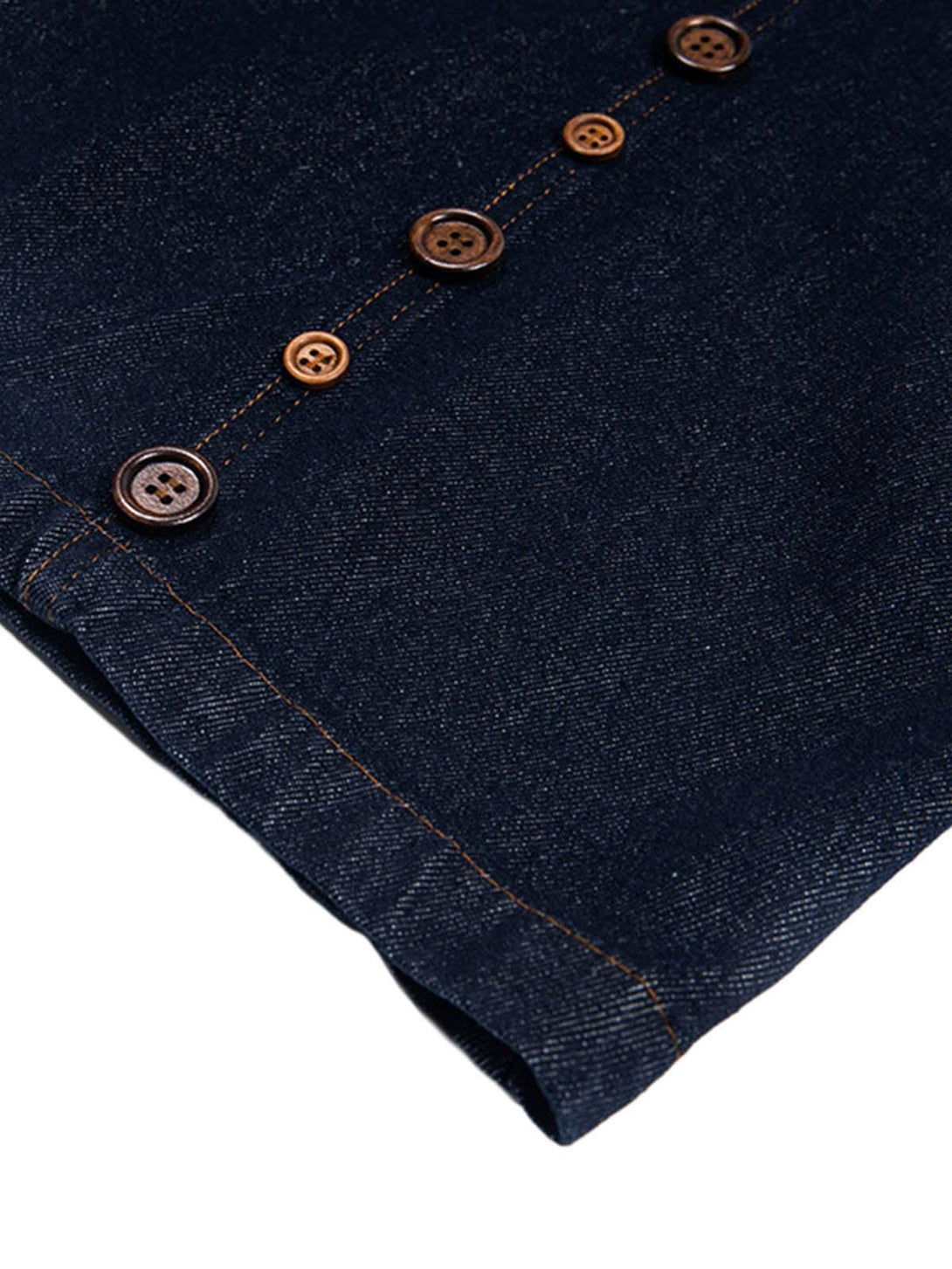 A detailed view of button accents on TALISHKO barrel jeans, highlighting craftsmanship.