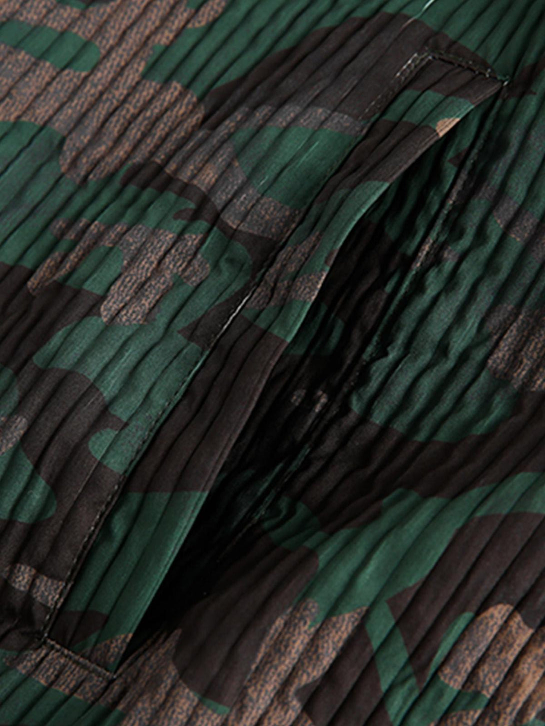 Focusing on the intricate fabric and pattern of TALISHKO's camouflage diamond patchwork jacket.