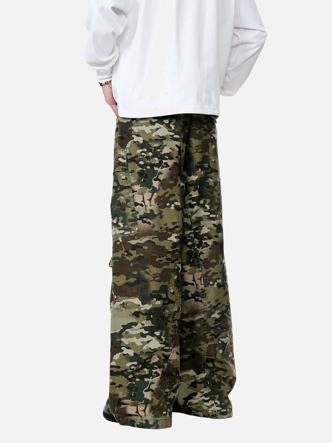 Back view of TALISHKO camouflage drawstring cargo pants highlighting their relaxed fit.