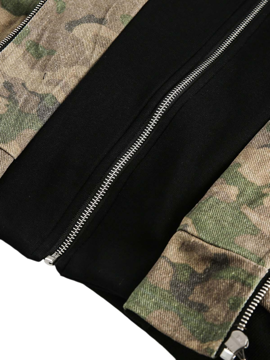 A detailed view of TALISHKO's camouflage jacket zippers, showcasing its faux two-piece style.