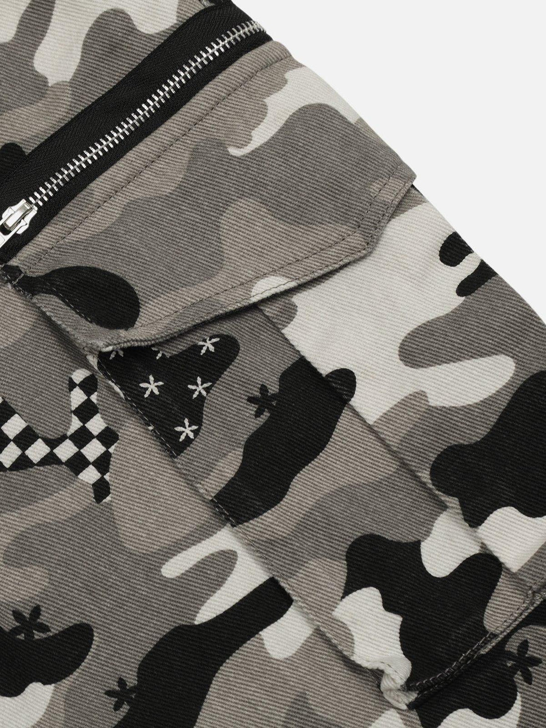 A detailed view of TALISHKO camouflage multi-pocket jeans, highlighting unique patterns and textures.