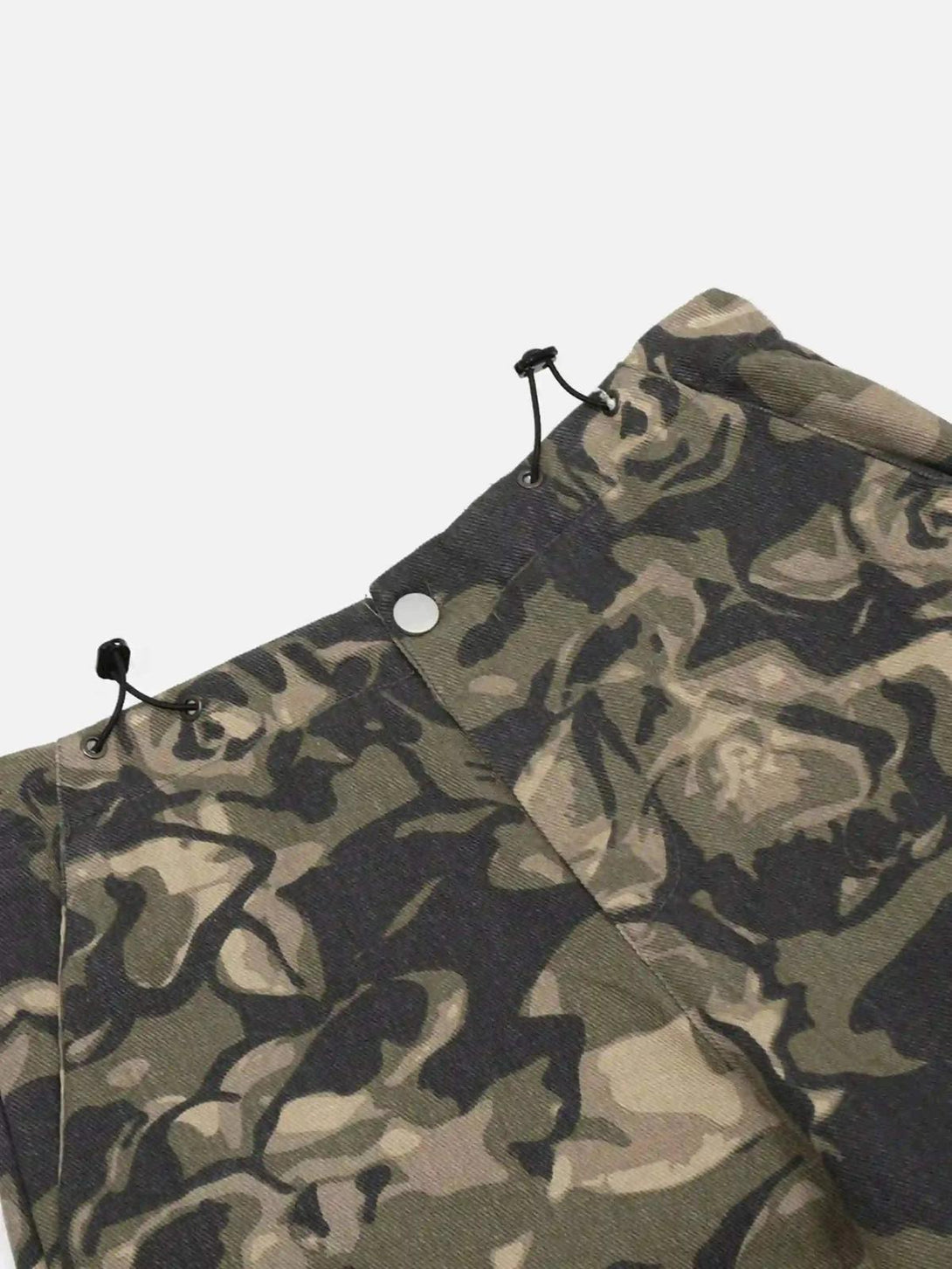 Detailed view of TALISHKO camouflage work pants showcasing drawstring detailing and pattern.