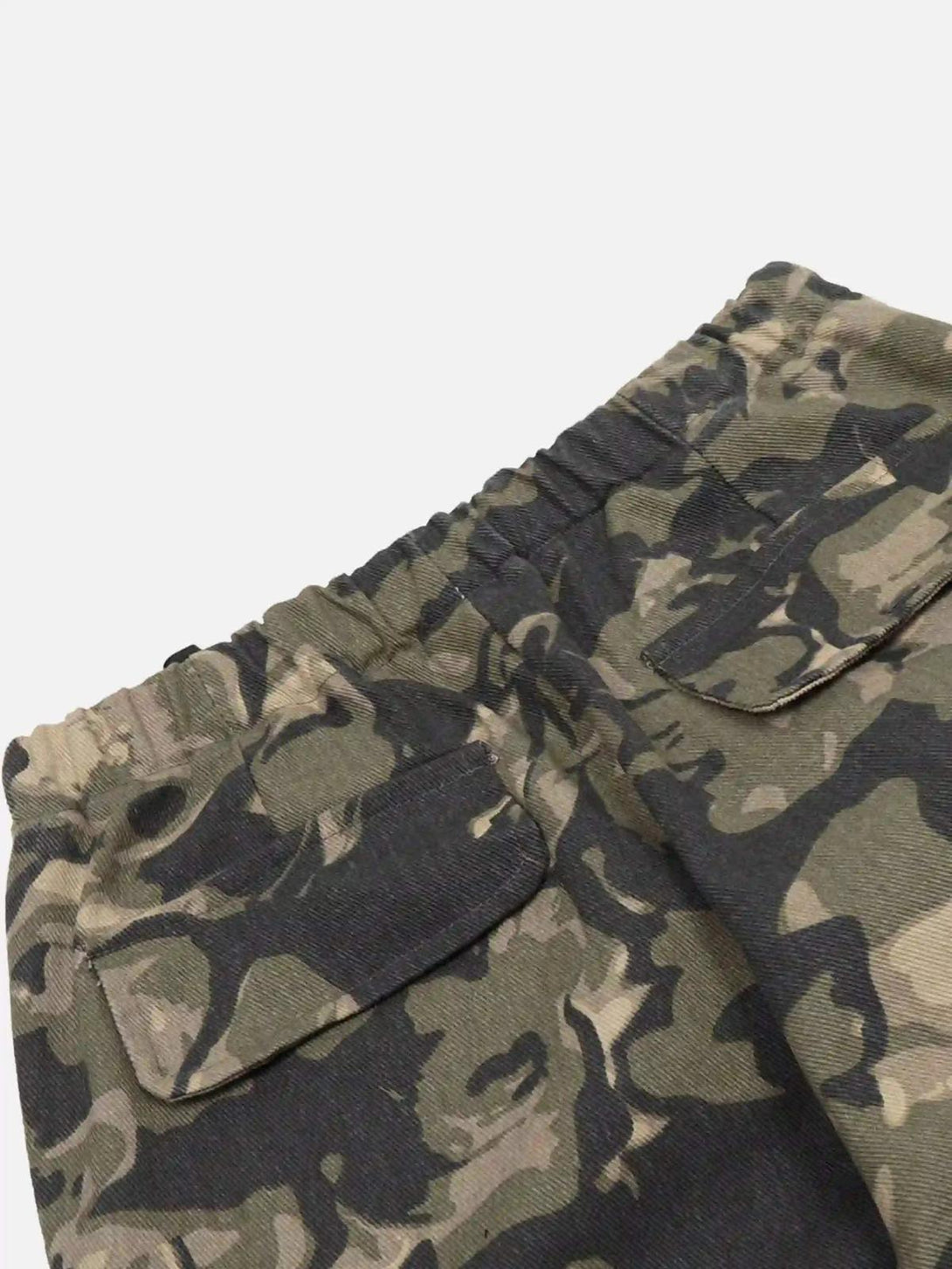 TALISHKO camouflage work pants with a focus on the multi-pocket design and rugged texture.