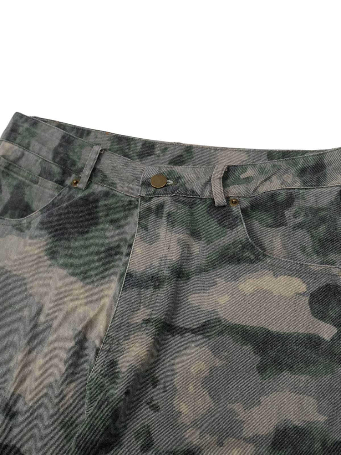A detailed view of TALISHKO cargo pants, emphasizing the camouflage pattern and waistband design.