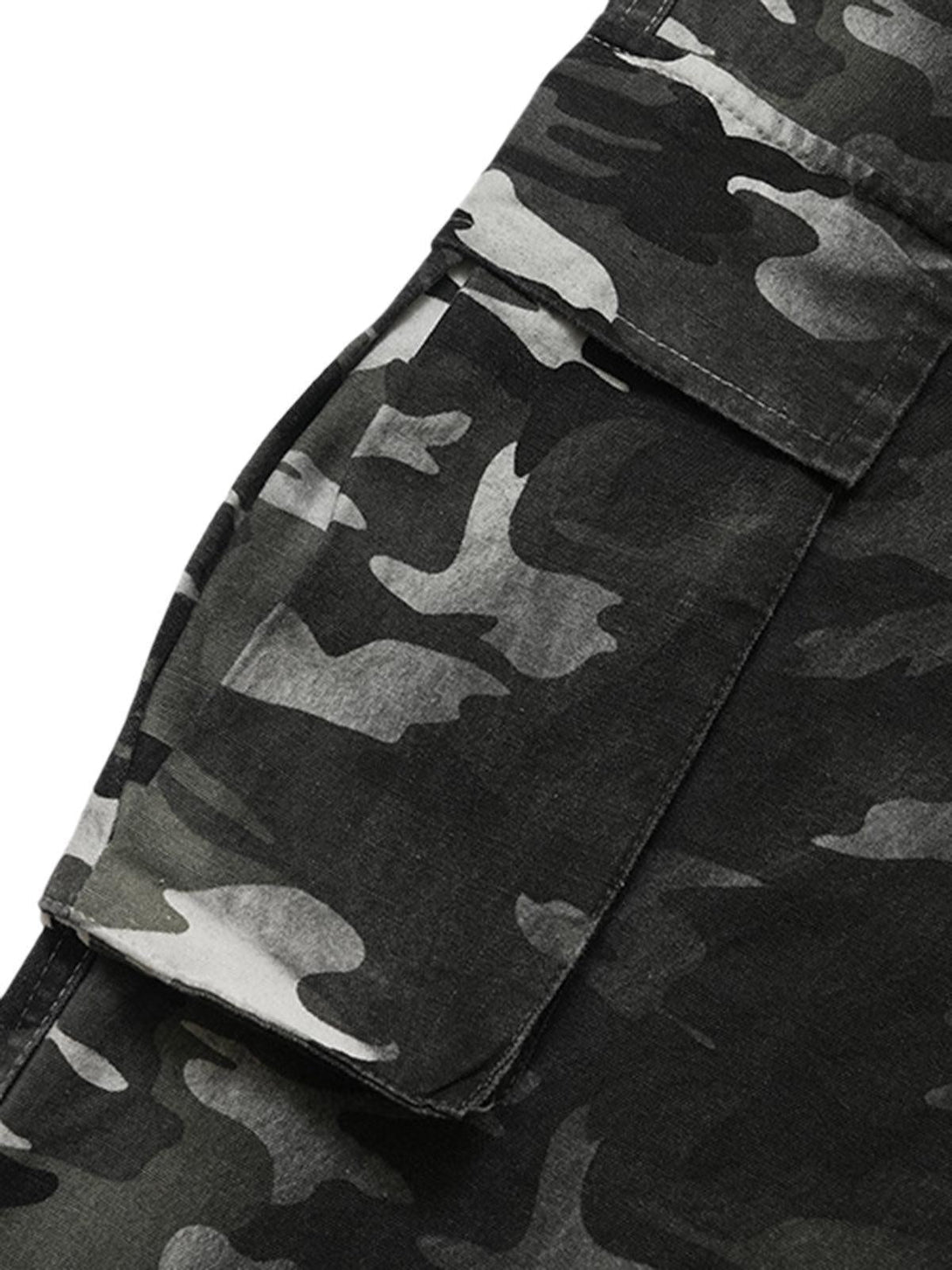 A detailed view of TALISHKO's camouflage cargo pants pocket, showcasing the multi-pocket design.