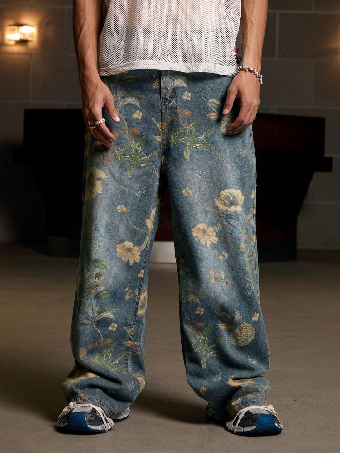Floral carpenter pants by TALISHKO, featuring a relaxed fit and intricate botanical patterns.
