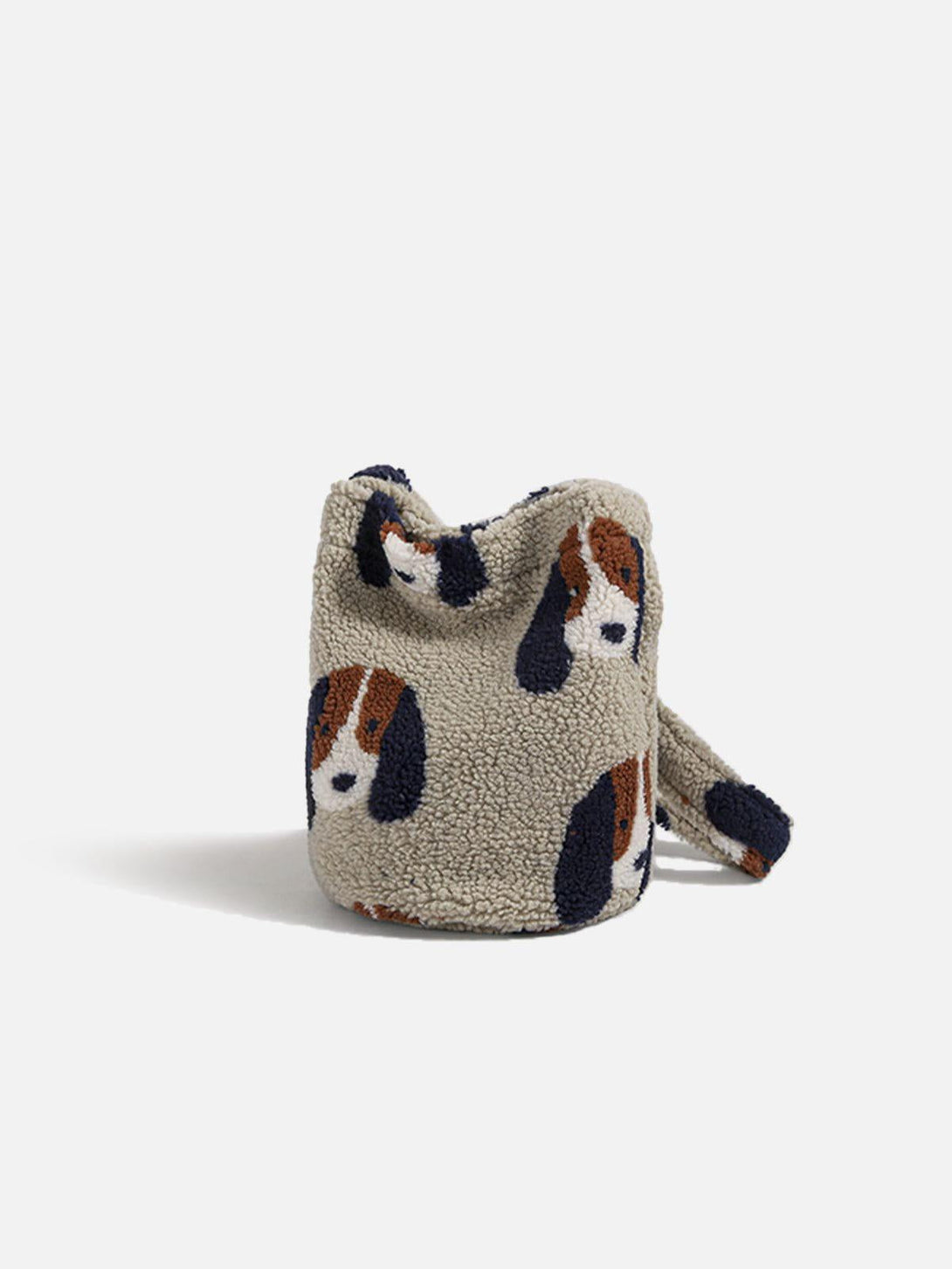 Cartoon dog plush bag by TALISHKO in a cozy texture, showcasing adorable dog patterns.