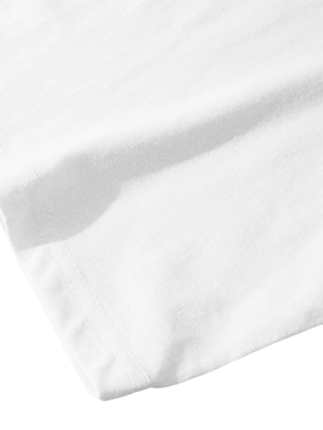 A detailed look at the soft fabric and stitching of a white loose T-shirt by TALISHKO.