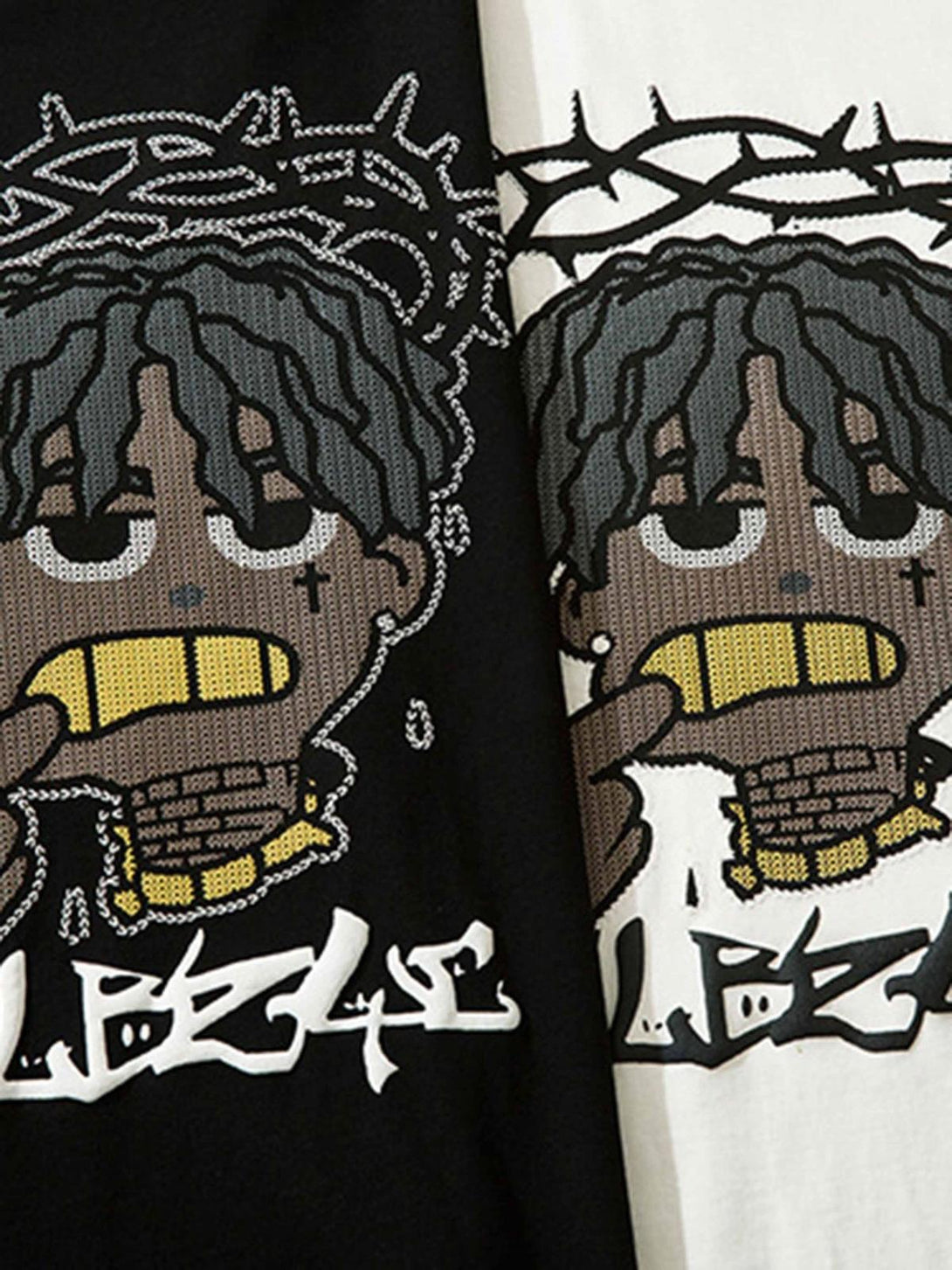 A close-up of the cartoon graphic on a black and white loose T-shirt by TALISHKO.