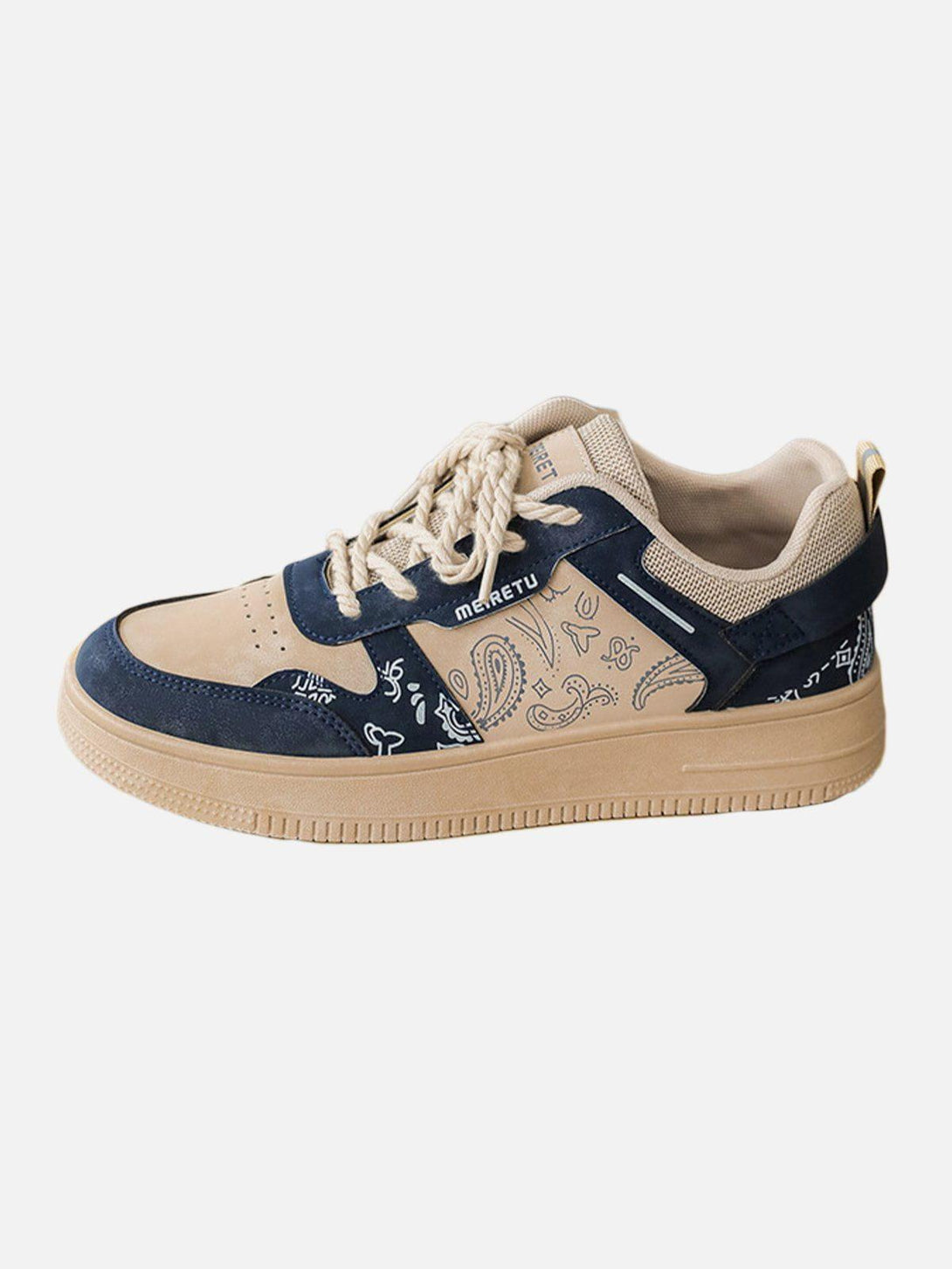 Side view of TALISHKO men's shoes featuring navy and tan cashew flower print design.