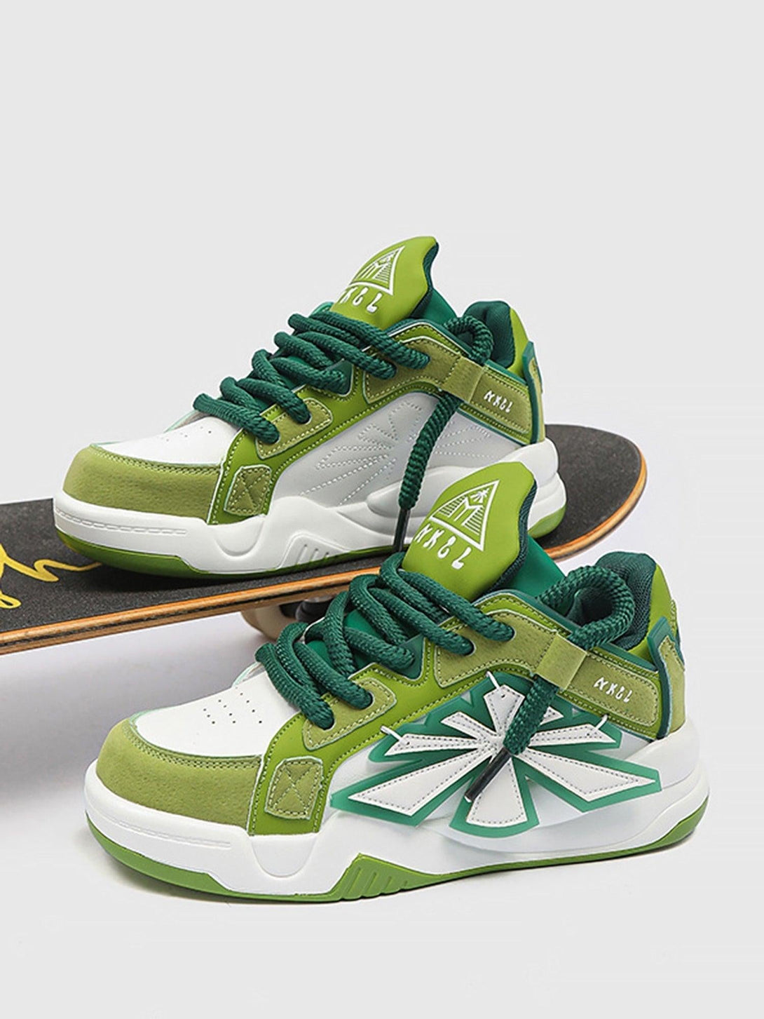 TALISHKO green preppy sneakers with bold star design, perfect for a trendy street look.