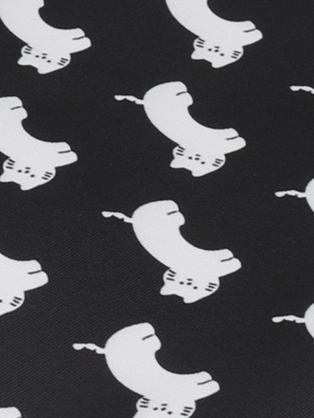 Playful white cat pattern on a black canvas by TALISHKO, highlighting whimsical style.