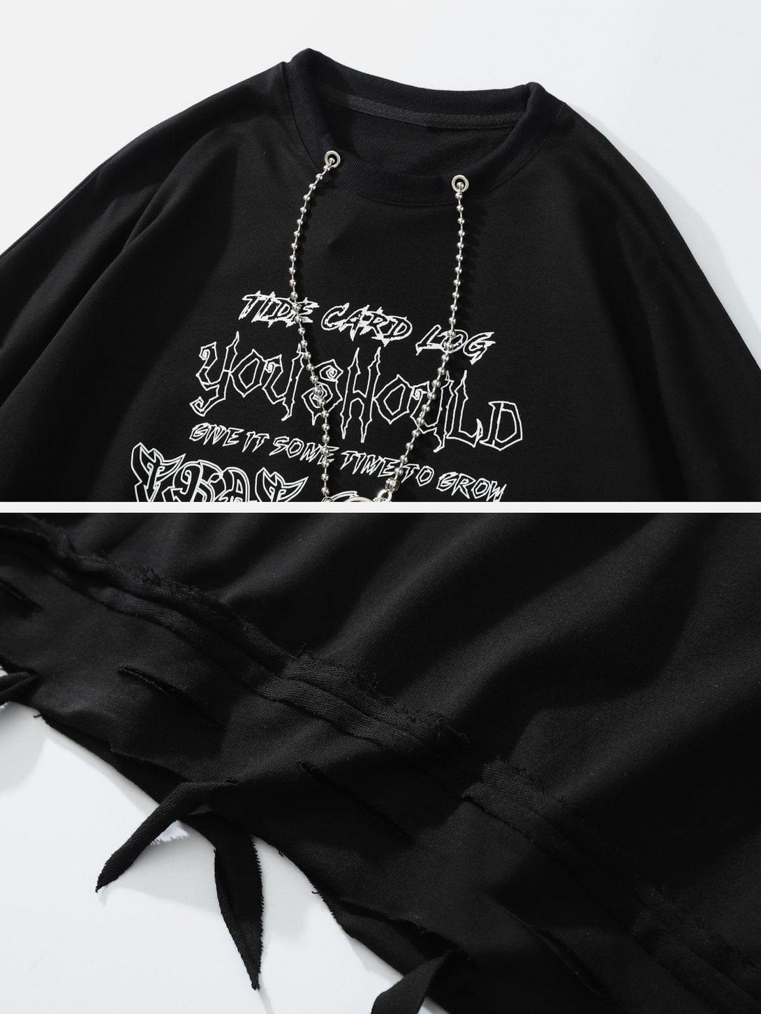 A detailed look at TALISHKO's black distressed tee with chain accents, highlighting its edgy design.