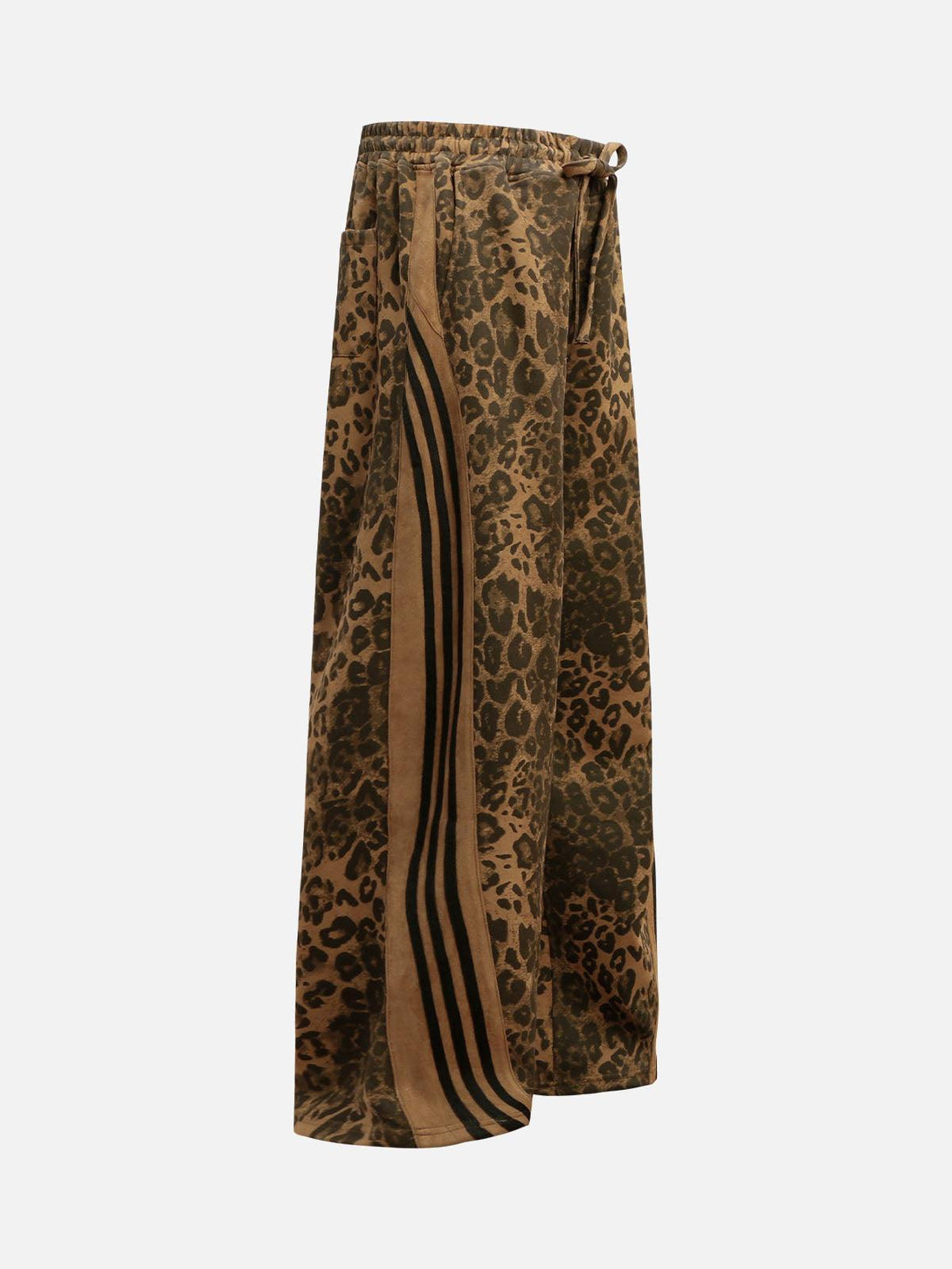 Side view of TALISHKO cheetah print suede pants featuring bold stripes and a relaxed fit.