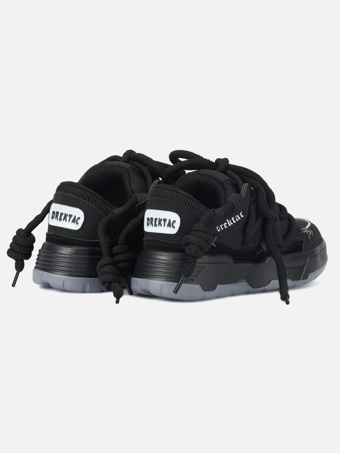 Back view of black chunky rope shoes by TALISHKO, emphasizing bold lace and heel design.