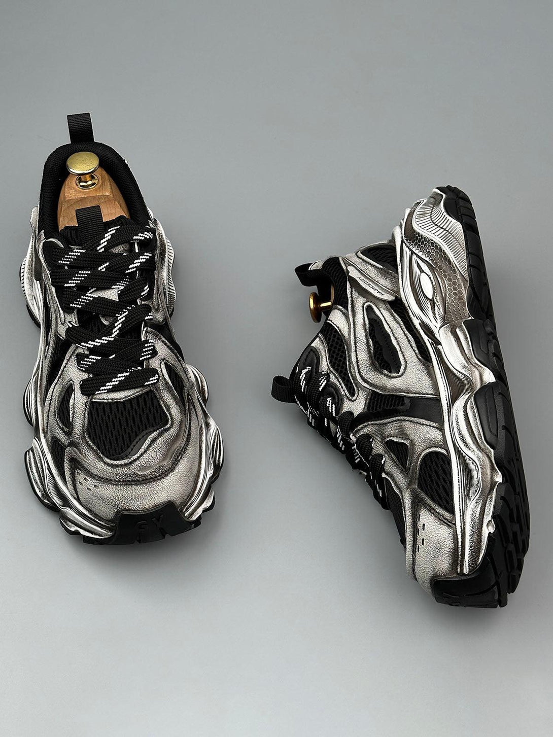 TALISHKO chunky sole sneakers in metallic, top view showcasing unique design and breathable mesh.